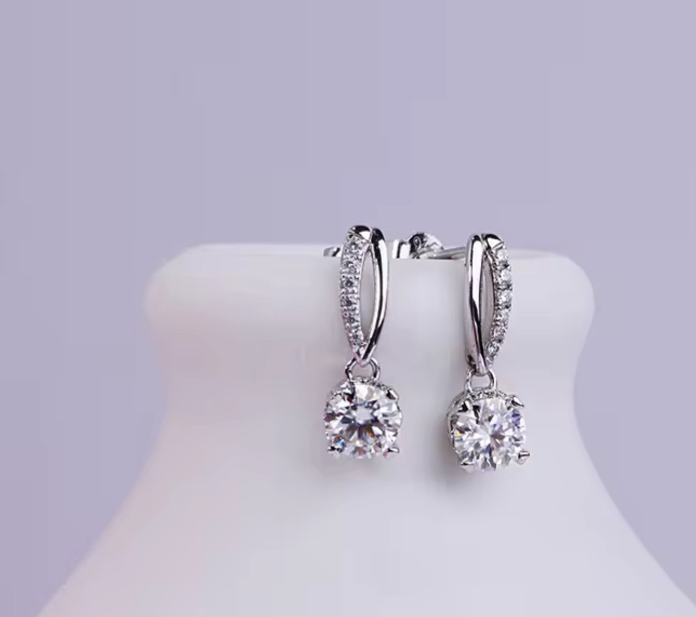 Moissanite earrings in a variety of colors