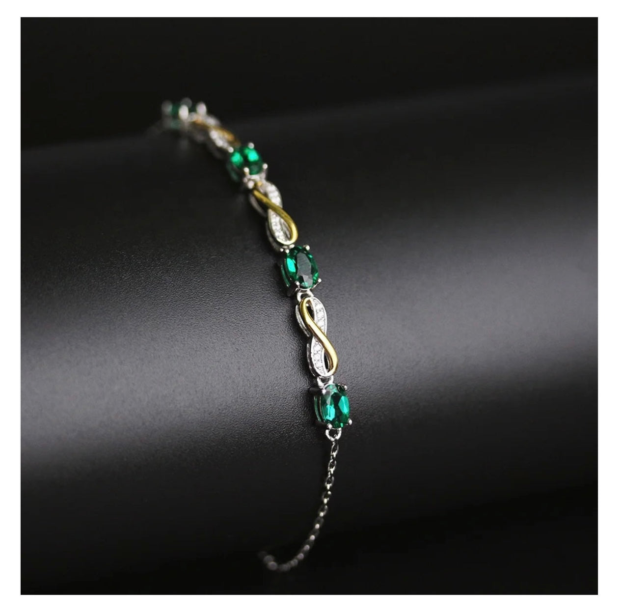 Emerald infinity motif bracelet