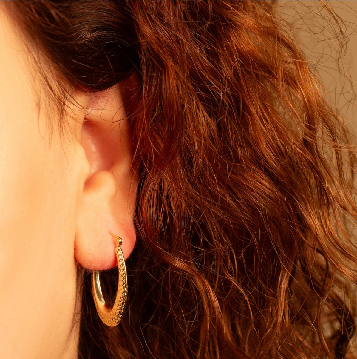 Yellow Gold Diamond Cut Oval Hoop Earrings