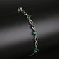 Emerald infinity motif bracelet